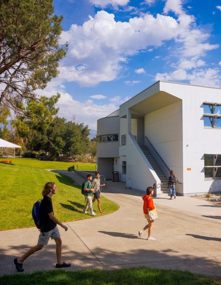 Students walking to class in front of Broad Hall